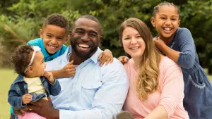 Large family smiling at the camera